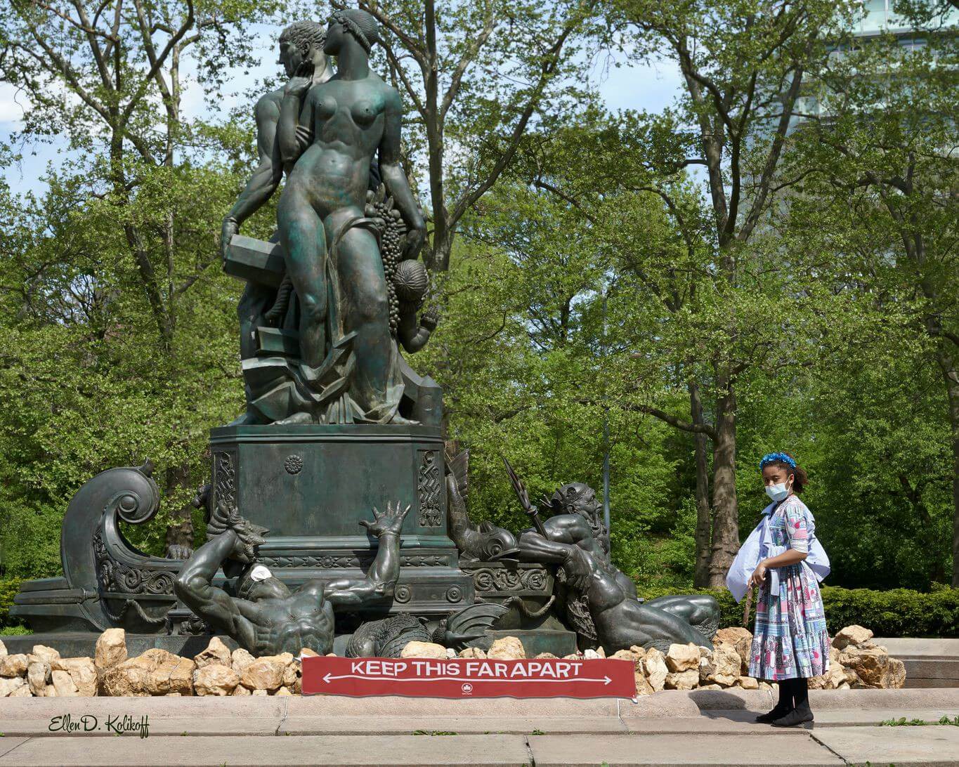 Plaza Fountain with Mask-May 16 2020 Socially distancing in Grand Army Plaza, Brooklyn NY, May 2020